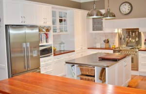 Traditional kitchen with stainless steel island benchtop